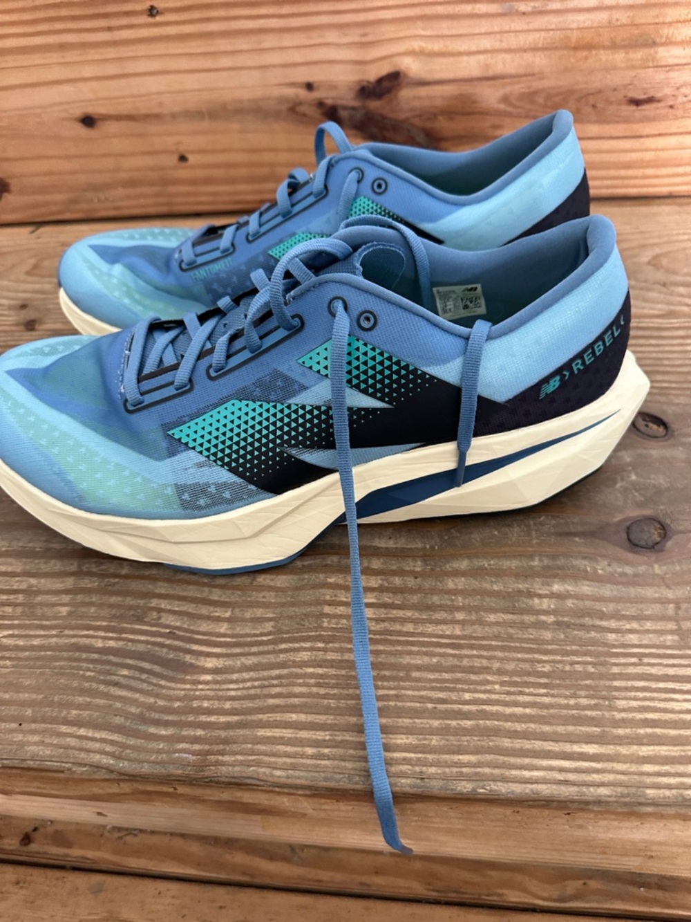 New Balance Rebel Lightweight Running Shoes in Blue and Teal